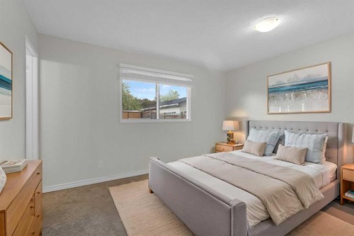 452 Queen Alexandra Way Se, Calgary, AB - Indoor Photo Showing Bedroom