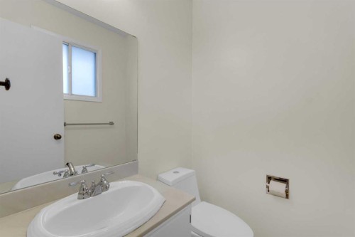 452 Queen Alexandra Way Se, Calgary, AB - Indoor Photo Showing Bathroom