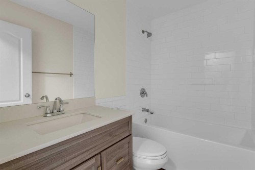 452 Queen Alexandra Way Se, Calgary, AB - Indoor Photo Showing Bathroom