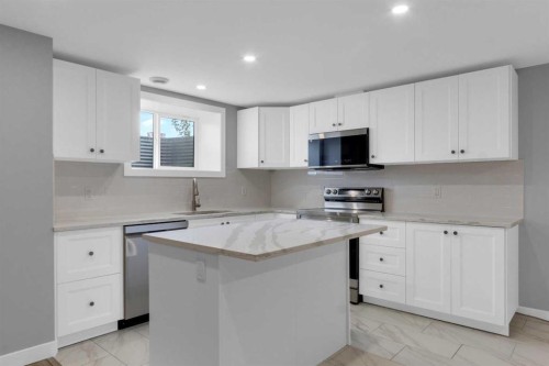 452 Queen Alexandra Way Se, Calgary, AB - Indoor Photo Showing Kitchen