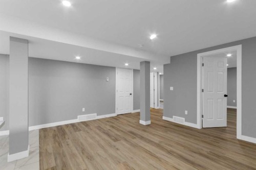 452 Queen Alexandra Way Se, Calgary, AB - Indoor Photo Showing Other Room