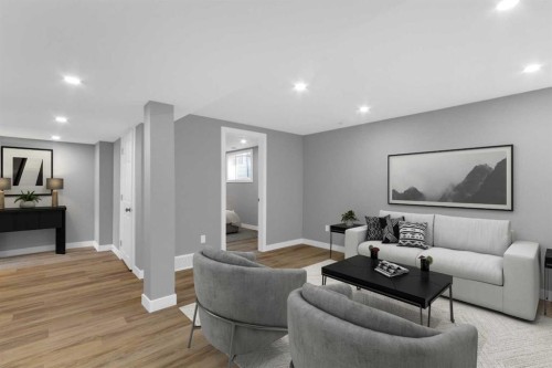 452 Queen Alexandra Way Se, Calgary, AB - Indoor Photo Showing Living Room