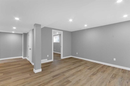 452 Queen Alexandra Way Se, Calgary, AB - Indoor Photo Showing Other Room