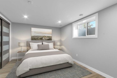 452 Queen Alexandra Way Se, Calgary, AB - Indoor Photo Showing Bedroom