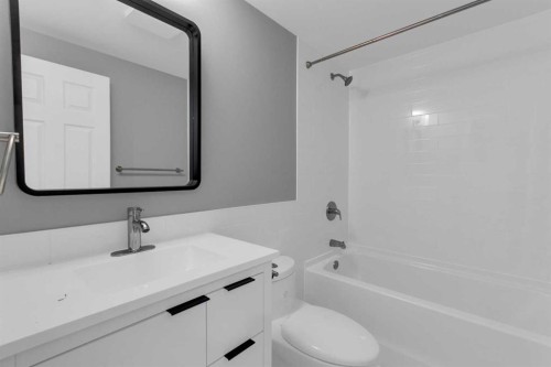 452 Queen Alexandra Way Se, Calgary, AB - Indoor Photo Showing Bathroom