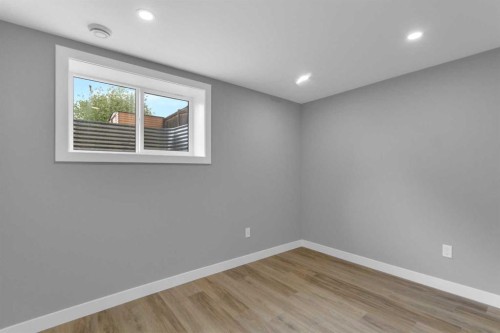 452 Queen Alexandra Way Se, Calgary, AB - Indoor Photo Showing Other Room