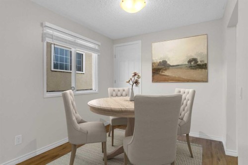452 Queen Alexandra Way Se, Calgary, AB - Indoor Photo Showing Dining Room