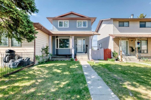 970 Berkley Drive Nw, Calgary, AB - Outdoor With Deck Patio Veranda With Facade
