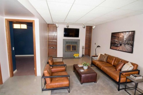 340 Templeton Circle Ne, Calgary, AB - Indoor Photo Showing Living Room With Fireplace