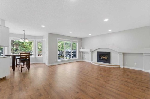 13919 Evergreen Street Sw, Calgary, AB - Indoor Photo Showing Living Room With Fireplace