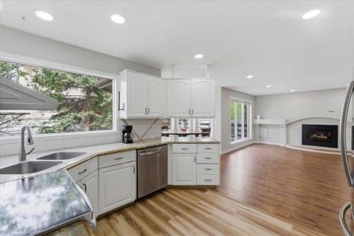 13919 Evergreen Street Sw, Calgary, AB - Indoor Photo Showing Kitchen With Double Sink