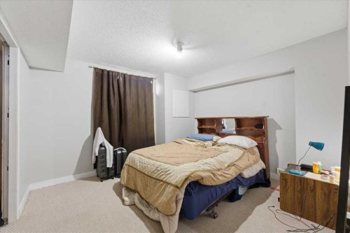 13919 Evergreen Street Sw, Calgary, AB - Indoor Photo Showing Bedroom