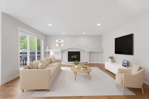 13919 Evergreen Street Sw, Calgary, AB - Indoor Photo Showing Living Room With Fireplace