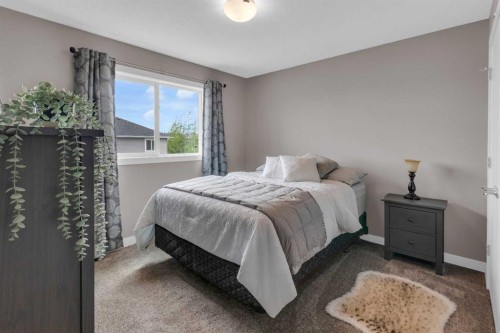145 Wildrose Drive, Strathmore, AB - Indoor Photo Showing Bedroom