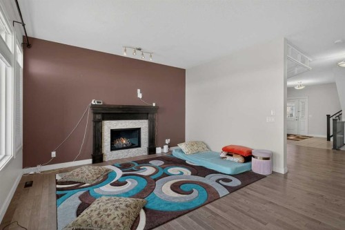 152 Redstone Villas Ne, Calgary, AB - Indoor With Fireplace