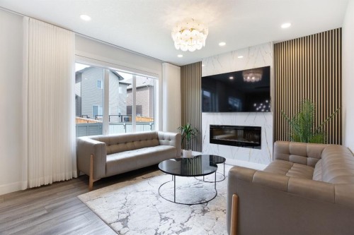 37 Savanna Heath Ne, Calgary, AB - Indoor Photo Showing Living Room With Fireplace