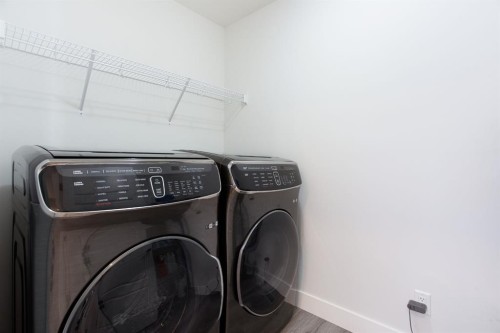 37 Savanna Heath Ne, Calgary, AB - Indoor Photo Showing Laundry Room