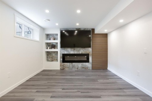 37 Savanna Heath Ne, Calgary, AB - Indoor Photo Showing Other Room With Fireplace