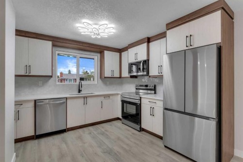 3640 Dover Ridge Drive Se, Calgary, AB - Indoor Photo Showing Kitchen With Stainless Steel Kitchen