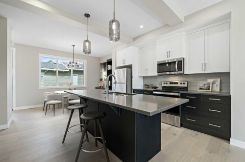400 Waterford Boulevard, Chestermere, AB - Indoor Photo Showing Kitchen With Upgraded Kitchen