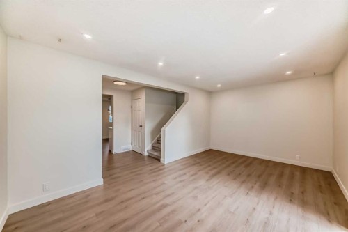32-1515 Falconridge Drive Ne, Calgary, AB - Indoor Photo Showing Other Room