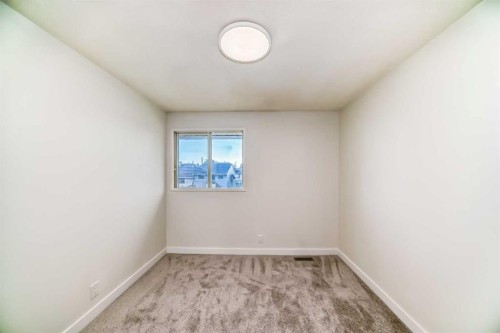 32-1515 Falconridge Drive Ne, Calgary, AB - Indoor Photo Showing Other Room