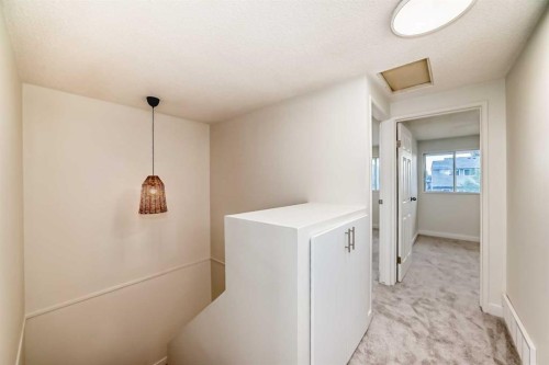 32-1515 Falconridge Drive Ne, Calgary, AB - Indoor Photo Showing Other Room