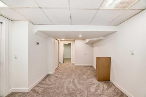32-1515 Falconridge Drive Ne, Calgary, AB - Indoor Photo Showing Other Room