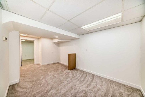 32-1515 Falconridge Drive Ne, Calgary, AB - Indoor Photo Showing Other Room