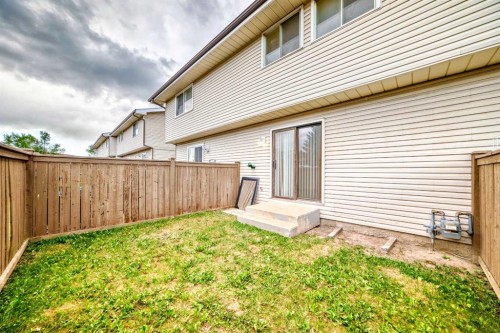 32-1515 Falconridge Drive Ne, Calgary, AB - Outdoor With Exterior
