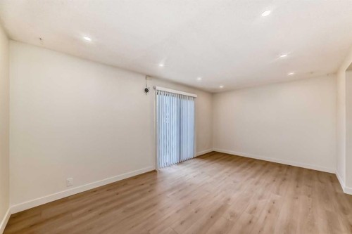 32-1515 Falconridge Drive Ne, Calgary, AB - Indoor Photo Showing Other Room