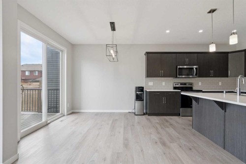 98 Seton Road Se, Calgary, AB - Indoor Photo Showing Kitchen With Upgraded Kitchen