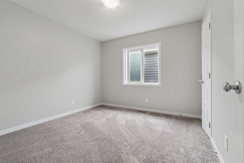 98 Seton Road Se, Calgary, AB - Indoor Photo Showing Other Room