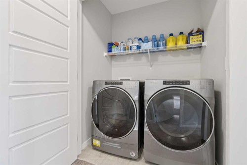 98 Seton Road Se, Calgary, AB - Indoor Photo Showing Laundry Room