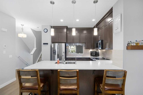 175 Silverado Plains Park Sw, Calgary, AB - Indoor Photo Showing Kitchen With Stainless Steel Kitchen With Upgraded Kitchen