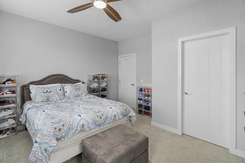 175 Silverado Plains Park Sw, Calgary, AB - Indoor Photo Showing Bedroom