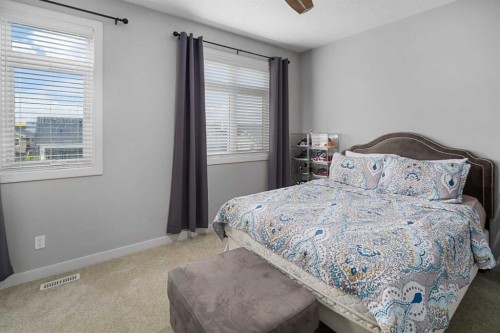 175 Silverado Plains Park Sw, Calgary, AB - Indoor Photo Showing Bedroom