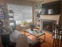 319-333 Riverfront Avenue Se, Calgary, AB  - Indoor Photo Showing Living Room With Fireplace 