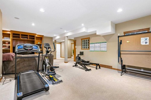 438 Candle Place Sw, Calgary, AB - Indoor Photo Showing Gym Room