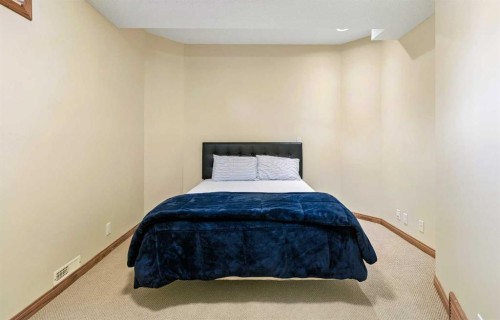 438 Candle Place Sw, Calgary, AB - Indoor Photo Showing Bedroom