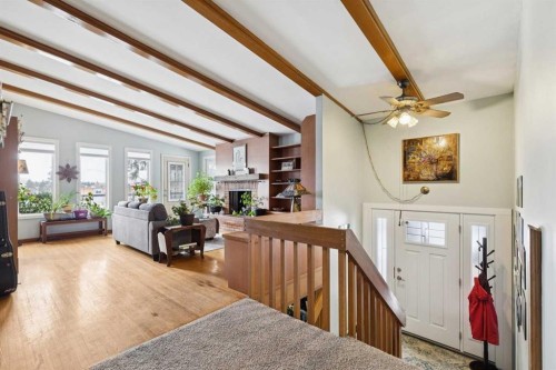 3232 15 Street Nw, Calgary, AB - Indoor Photo Showing Other Room With Fireplace