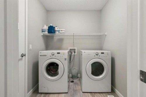 65 Fireside Crescent, Cochrane, AB - Indoor Photo Showing Laundry Room