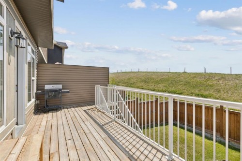 65 Fireside Crescent, Cochrane, AB - Outdoor With Deck Patio Veranda With Exterior