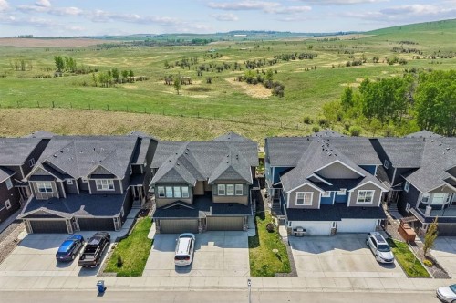 65 Fireside Crescent, Cochrane, AB - Outdoor With Facade