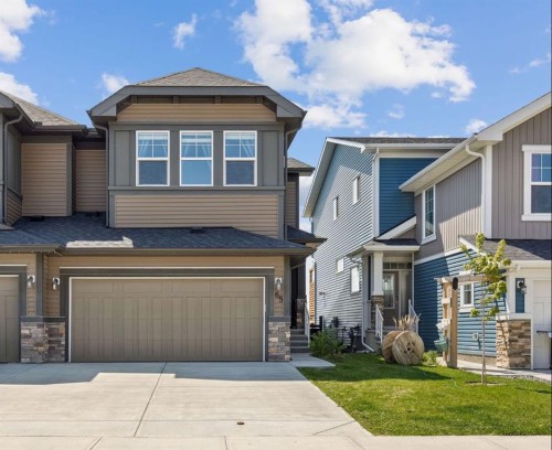 65 Fireside Crescent, Cochrane, AB - Outdoor With Facade