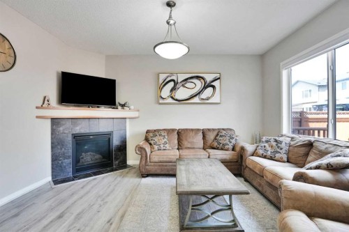 454 Skyview Ranch Way Ne, Calgary, AB - Indoor Photo Showing Living Room With Fireplace