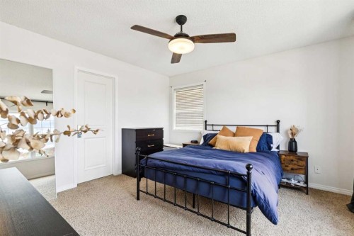 411 Silverado Drive Sw, Calgary, AB - Indoor Photo Showing Bedroom