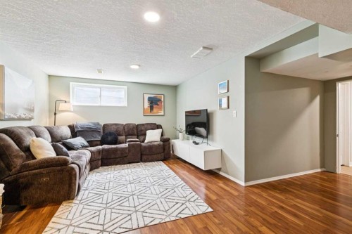 411 Silverado Drive Sw, Calgary, AB - Indoor Photo Showing Living Room