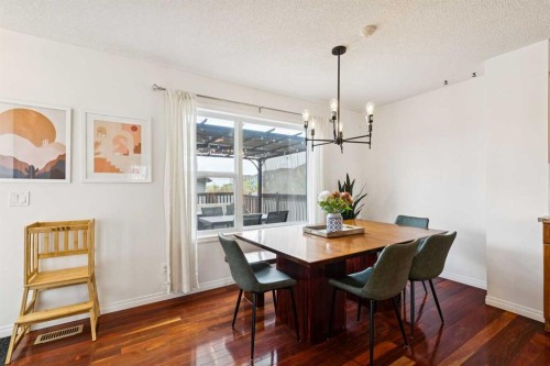 411 Silverado Drive Sw, Calgary, AB - Indoor Photo Showing Dining Room