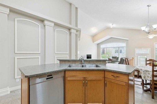 94 Panatella Close Nw, Calgary, AB - Indoor Photo Showing Kitchen With Double Sink